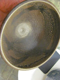 Ceramics: Toshiko Takaezu 6.5" diameter bowl w/ chip.