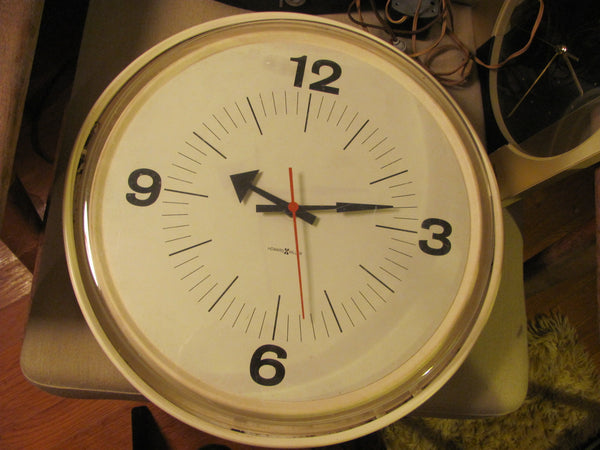 Clock: Howard Miller Model 6223 Wall Clock by George Nelson