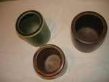 Ceramics: A Saxbo Round Green Ceramic Vase,